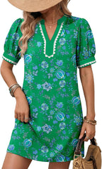 Green floral short sleeve dress with V-neck and white scalloped trim, puff sleeves