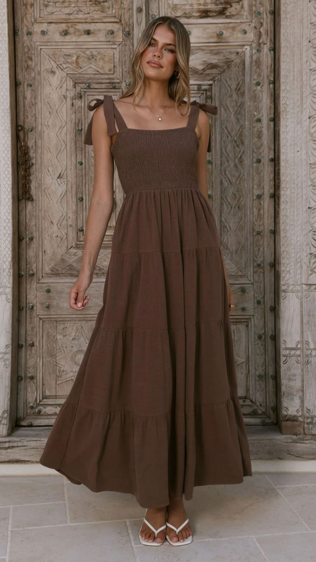 Dark brown sleeveless summer dress, square neckline, gathered tiered skirt, ankle length