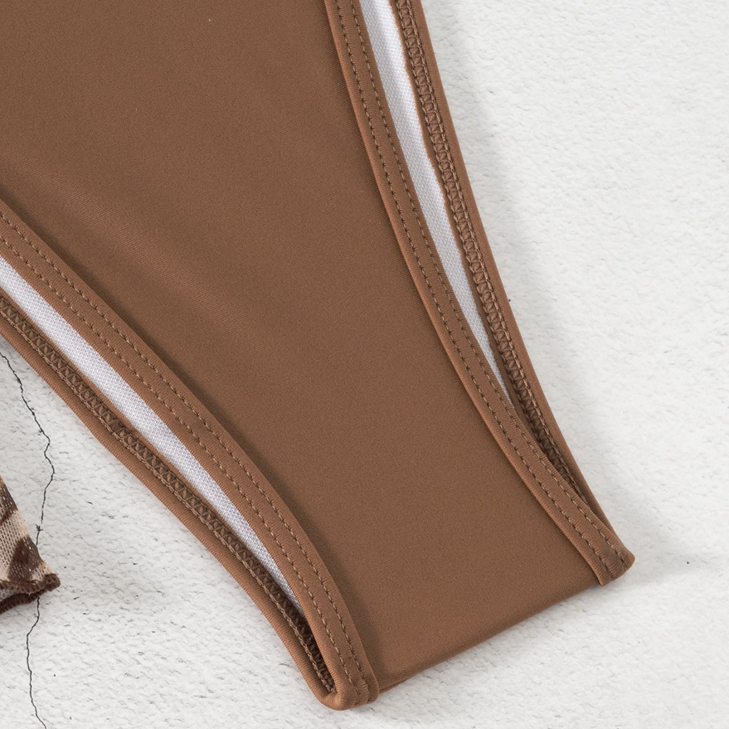 Brown high-leg swimwear bottom with double-stitched trim