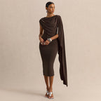 Brown sleeveless midi dress with draped cowl neckline and flowing side overlay