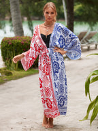 Printed beach jacket cardigan with red and navy floral print panels, open front tied waist
