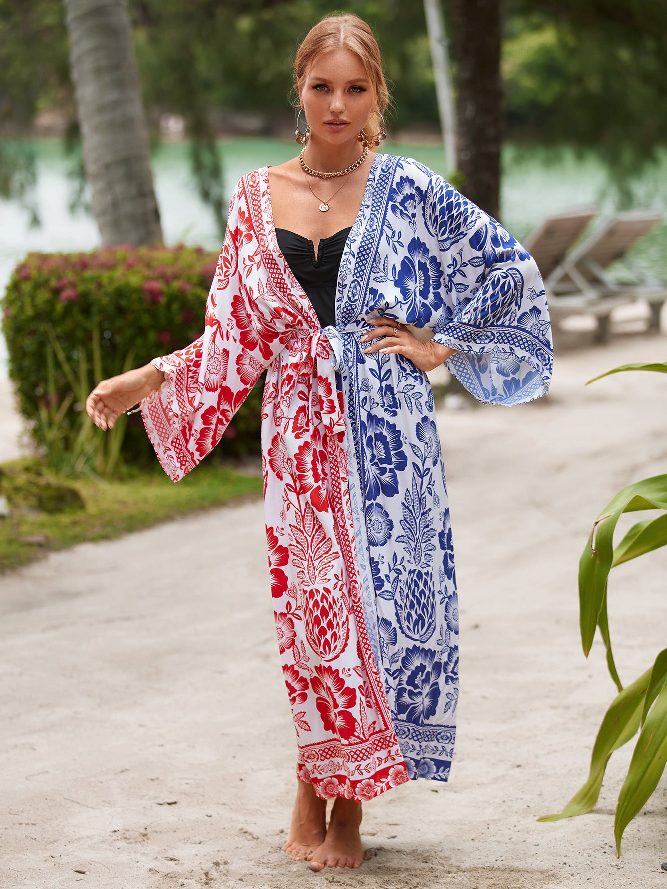 Printed beach jacket cardigan with red and navy floral print panels, open front tied waist