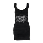 Black lace overlay sleeveless bodycon mini dress with ruched skirt.