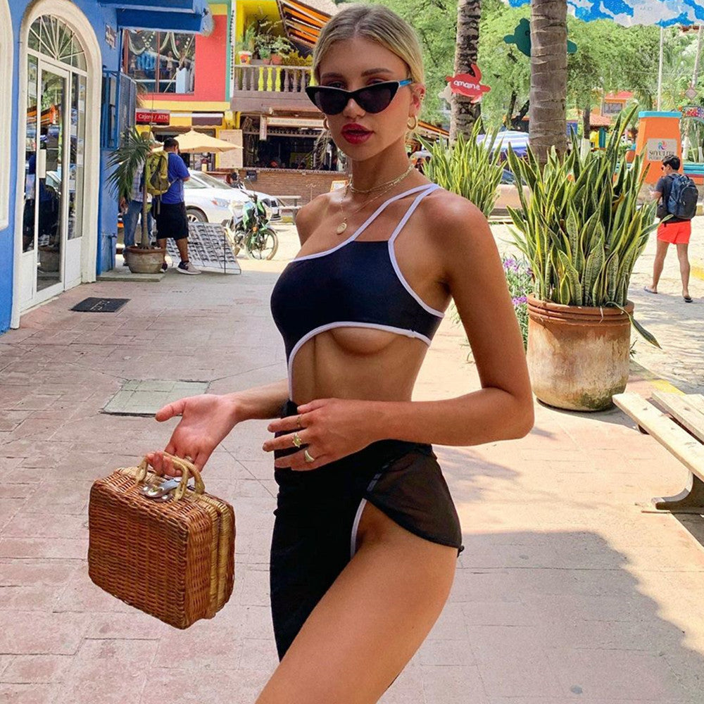 Womens black one-piece swimsuit with white piping and mesh side panel