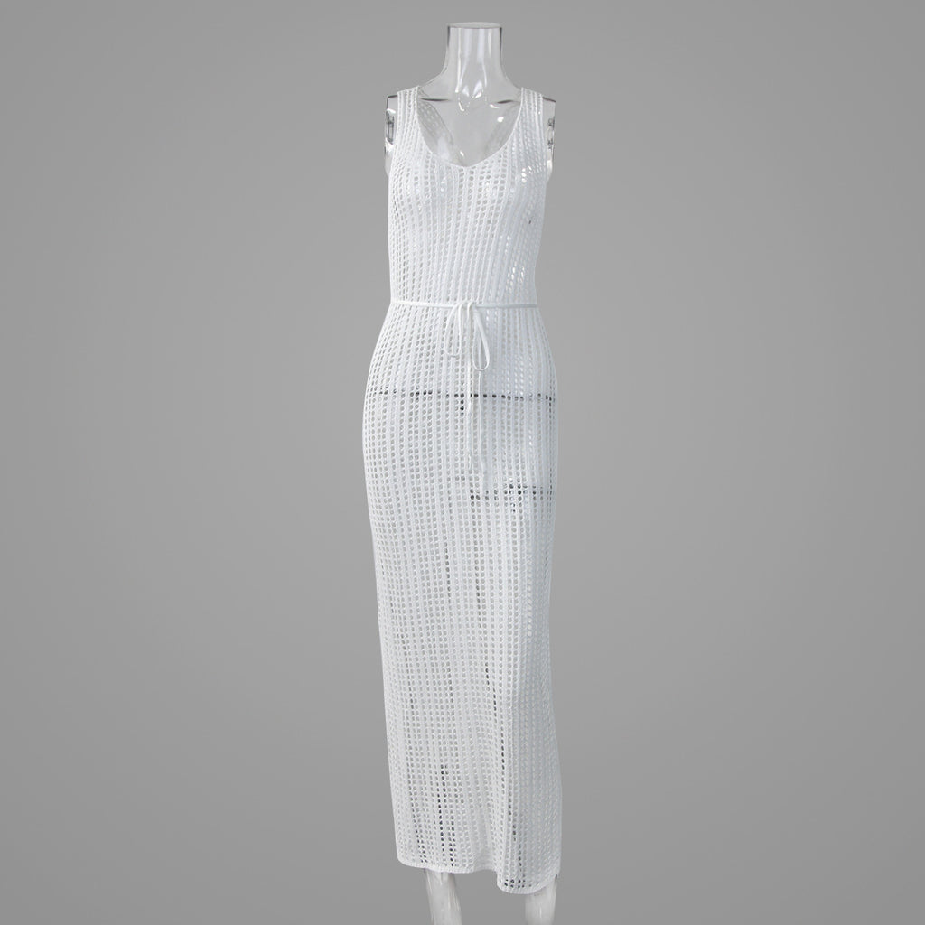 White knitted maxi dress with scoop neck, sleeveless design, and openwork pattern