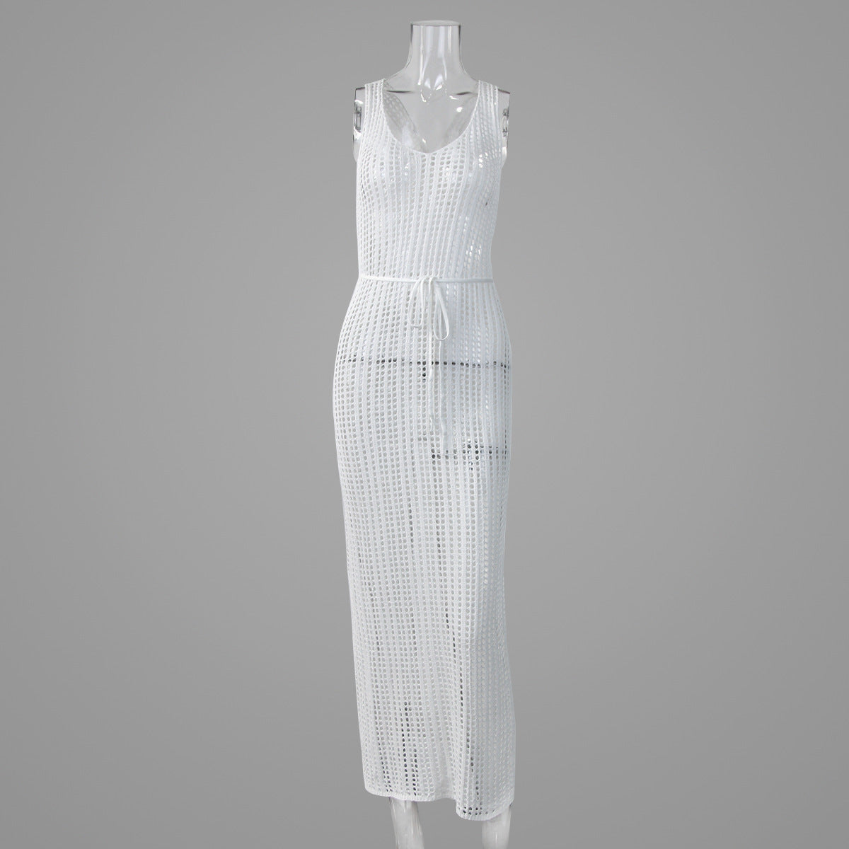 White knitted maxi dress with scoop neck, sleeveless design, and openwork pattern