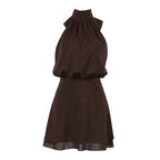 Brown halter mini dress flat lay with high neck ruching and layered skirt