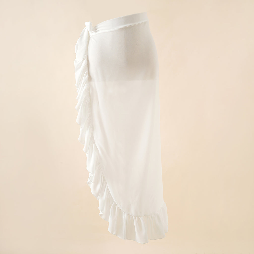 White wrap beach skirt with side bow detail and tiered ruffle hem
