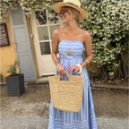 Blue striped backless maxi dress with spaghetti straps and gathered waist