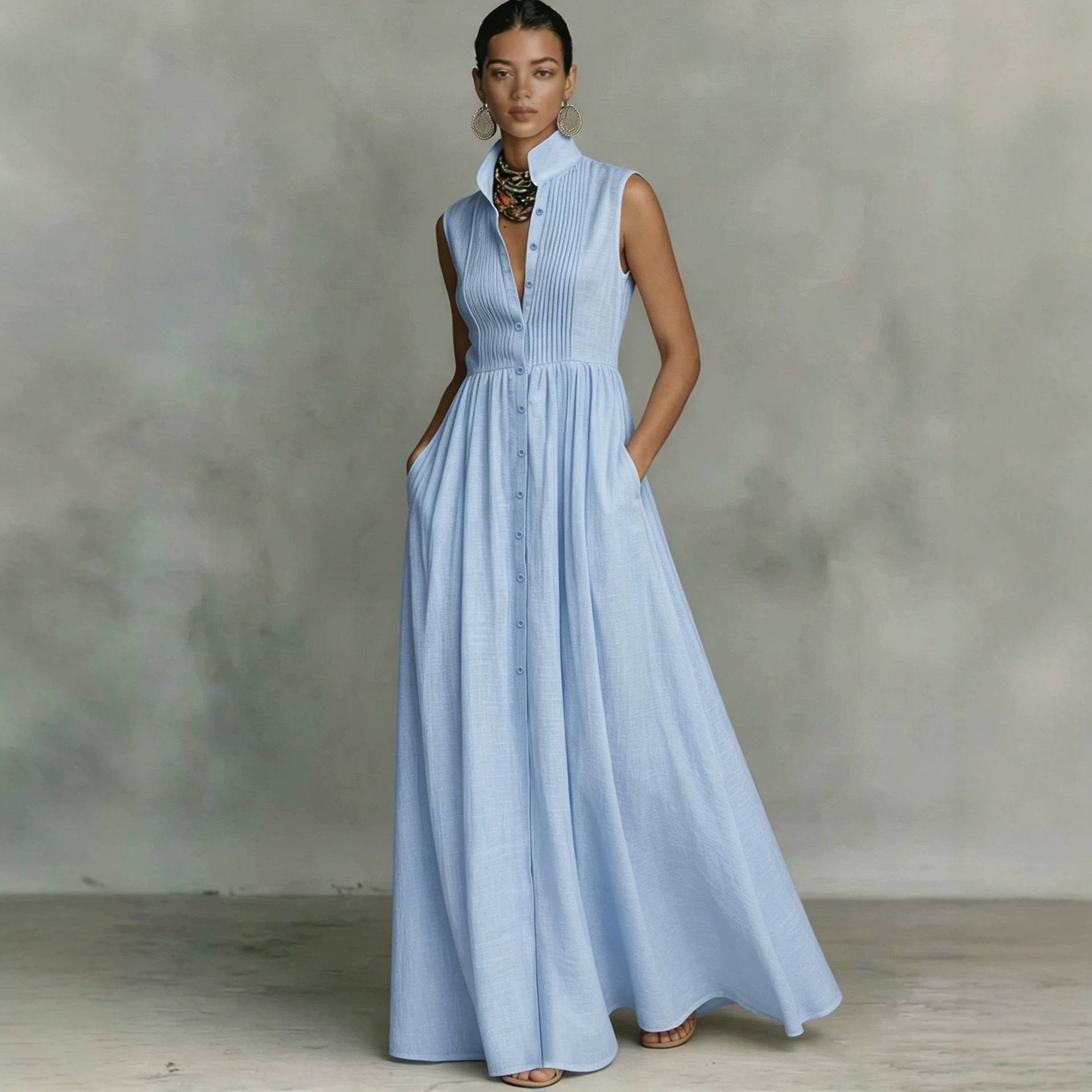 Light blue vertical-striped sleeveless maxi dress, button-front, pleated skirt