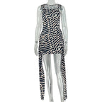 Leopard print lace cami dress with long side fringe on mannequin