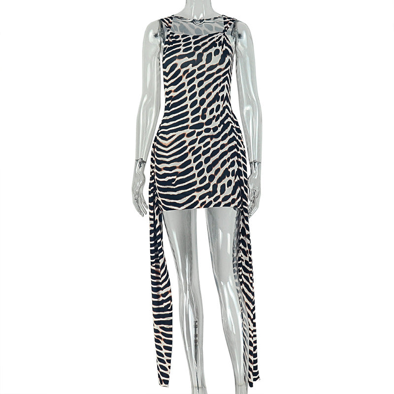 Leopard print lace cami dress with long side fringe on mannequin