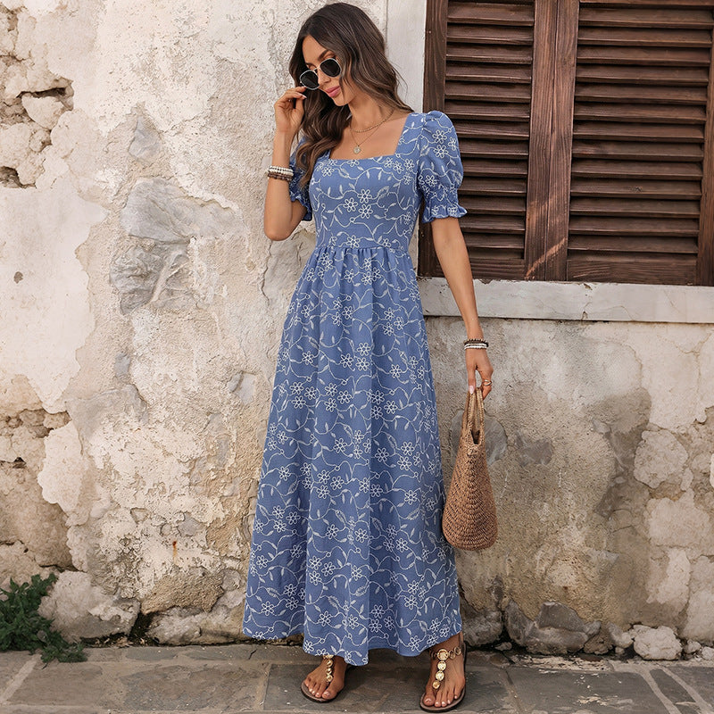 Blue floral midi dress with square neckline, puff sleeves, and gathered waist