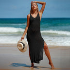 Black sleeveless knit maxi dress with chevron stripes and high side slit
