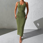 Olive green knitted maxi dress with scoop neck, sleeveless design, and openwork pattern