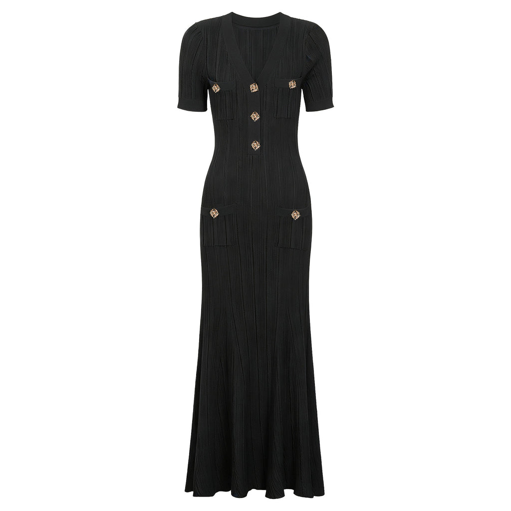 Black maxi short sleeve dress with ribbed texture and decorative button details down the front