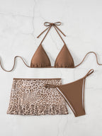 Brown halter swimwear set with leopard ruffle skirt and matching high-leg bottom