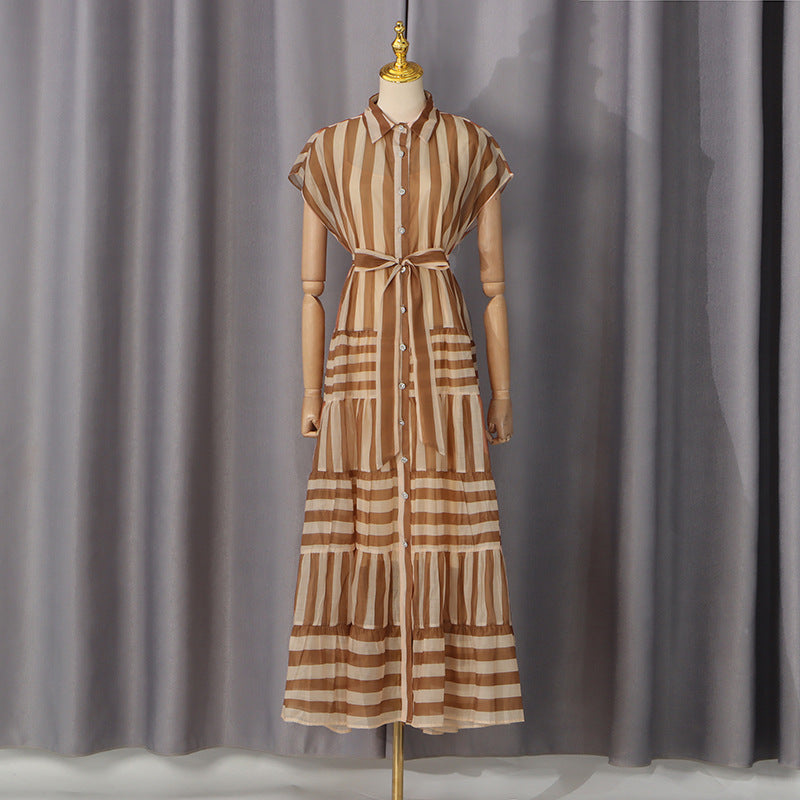 Khaki striped tiered lace dress on mannequin, button-front, tie waist, sleeveless