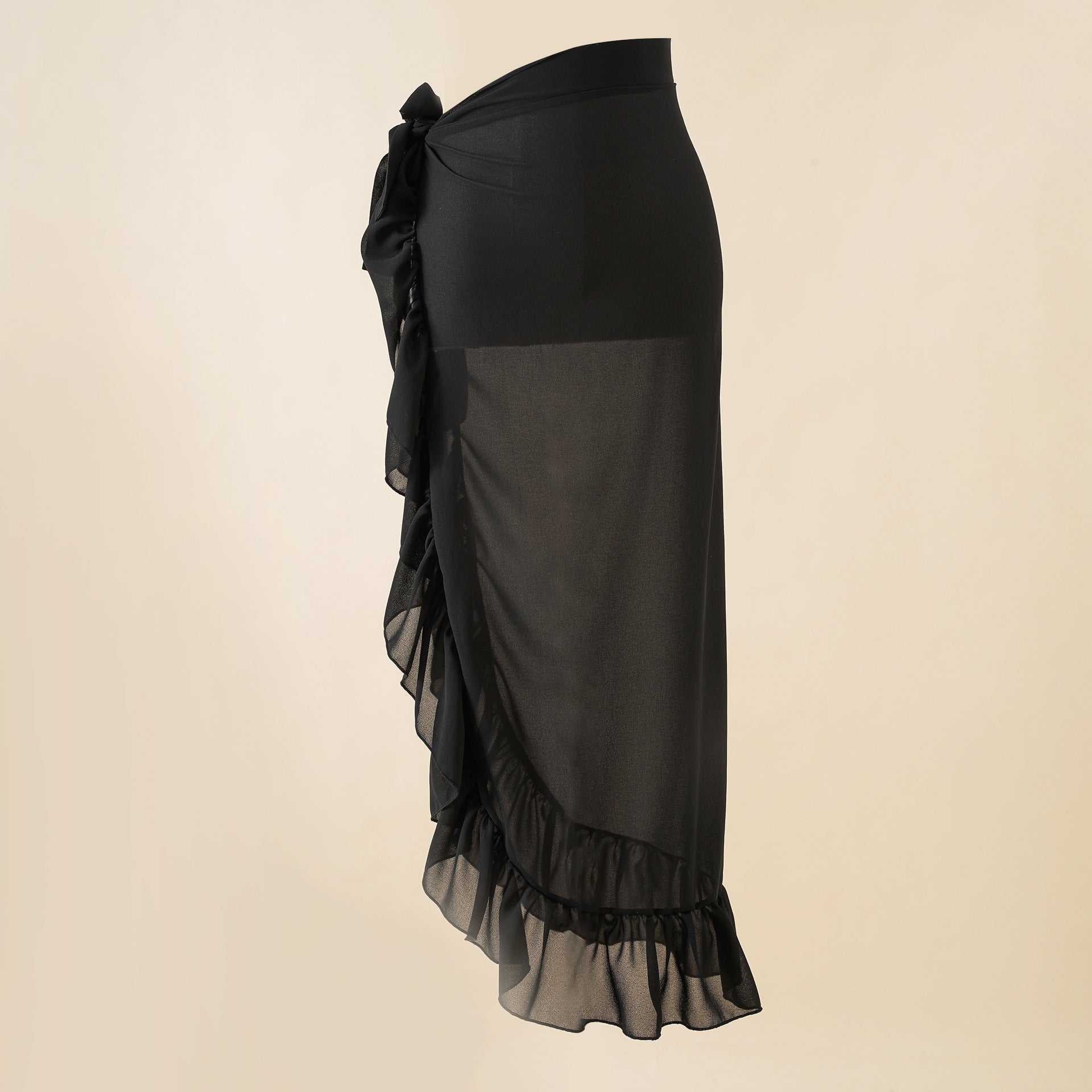 Black wrap beach skirt with side bow detail and tiered ruffle hem