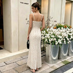 Spaghetti-strap long slip dress with dot print, thin straps, and open back