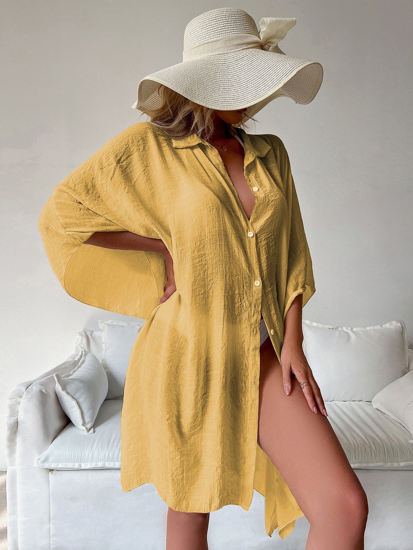 Mustard yellow bamboo cotton cover-up shirt with short sleeves, button front, draped hem.