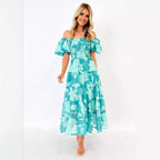 Green chiffon summer dress with off-shoulder neckline, puff sleeves, tiered floral print