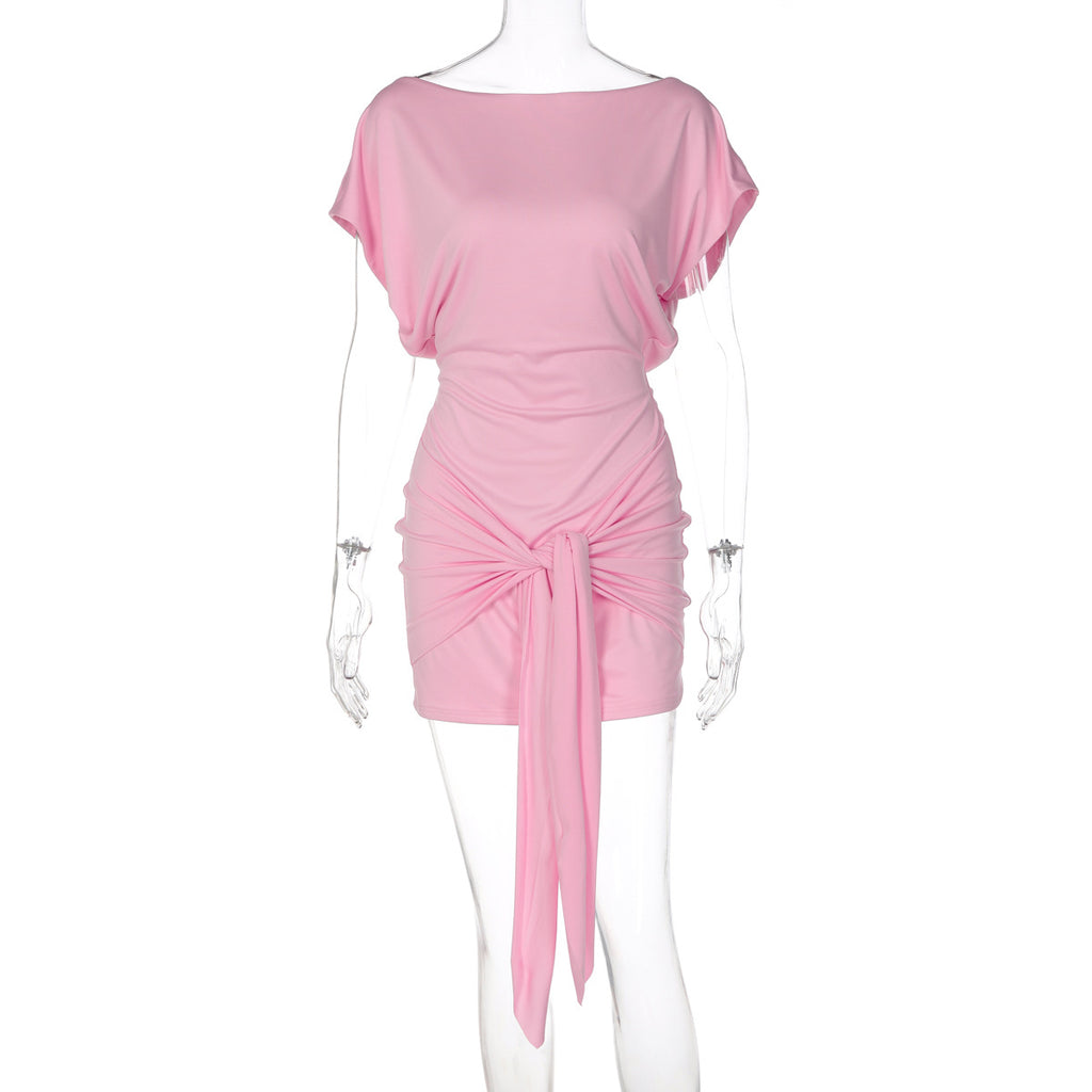 Pink off-shoulder sheath dress with draped skirt and ruched waist tie, short sleeves