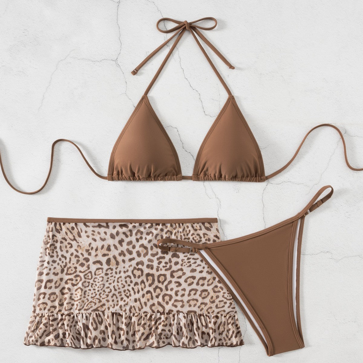 Brown triangle halter swimwear with leopard ruffle skirt and matching high-leg bottom