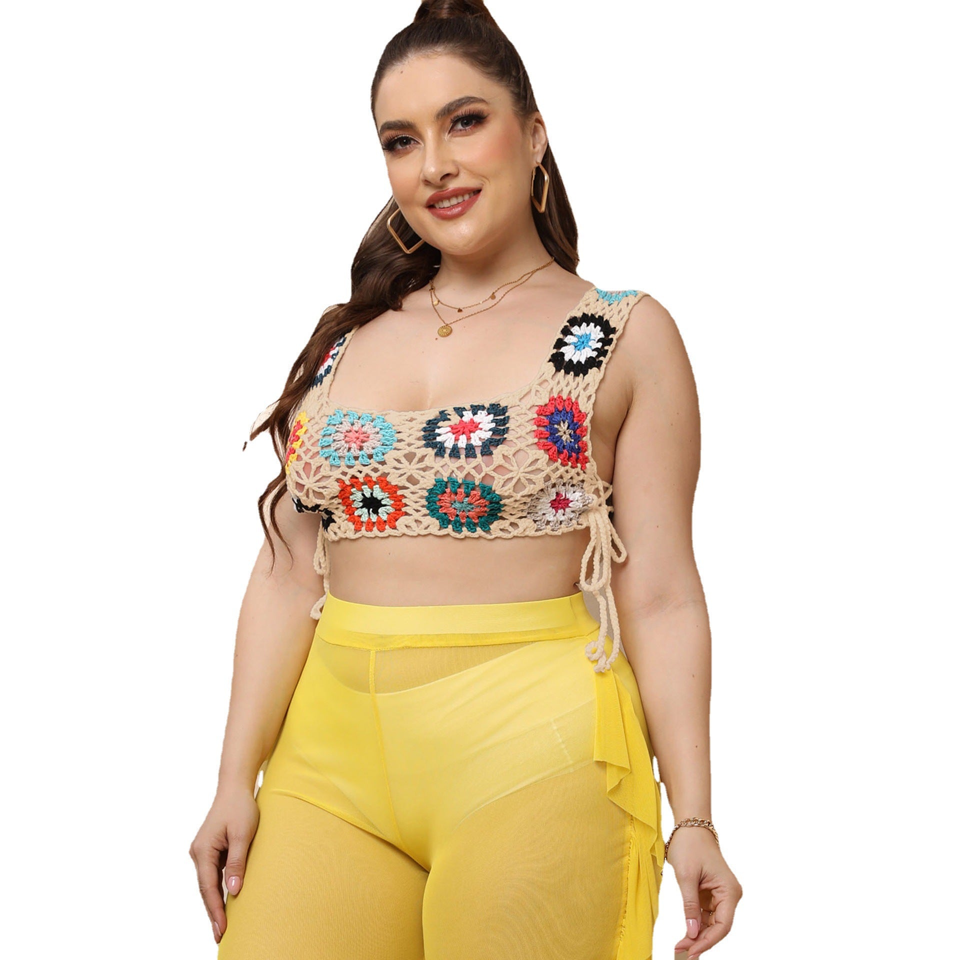 Floral crocheted crop vest with multicolor granny squares and black tie straps