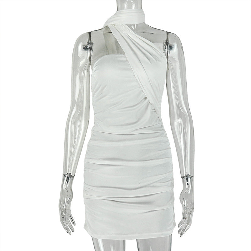 White halter mini dress with draped neckline and ruched detailing