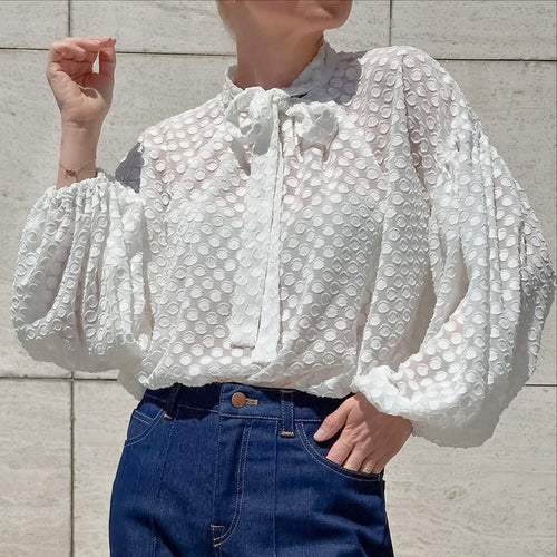 White polka dot jacquard blouse with lace collar and bow tie, lantern sleeves