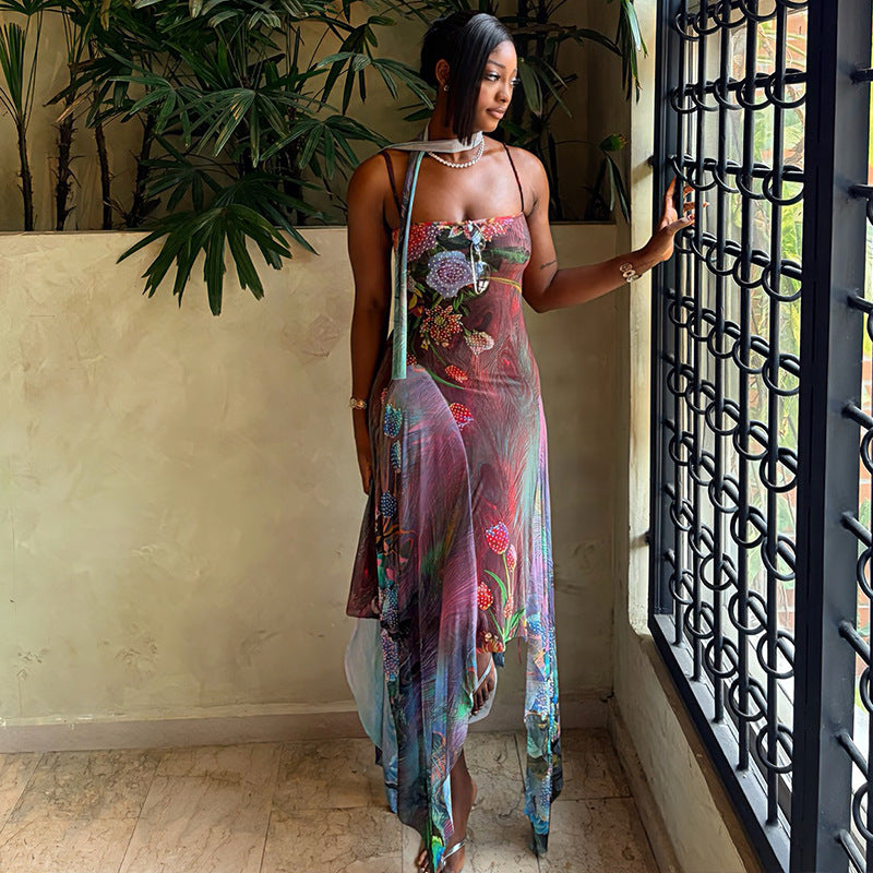 Multicolor floral maxi cami dress with spaghetti straps and flowing ankle-length skirt