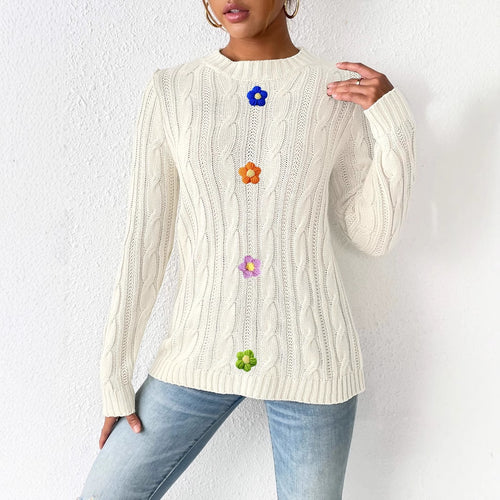 Cream cable-knit sweater, round neck, long sleeves, vertical floral appliques