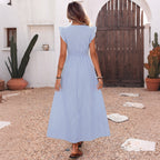 Light blue striped midi dress, back view with gathered waist and short cap sleeves