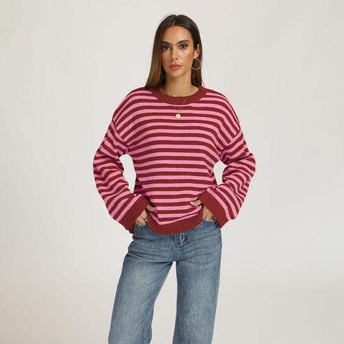 Women’s loose striped sweater, pink and burgundy horizontal stripes, crew neck.