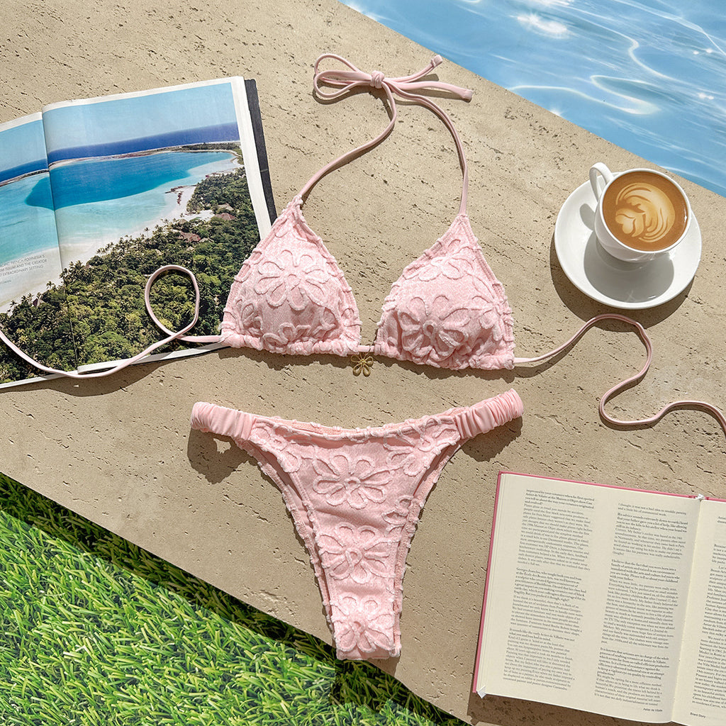 Pink floral-embroidered triangle bikini top with matching high-cut bottoms