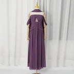 Back view of purple halter summer dress with gathered panels and long skirt