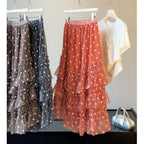 Red tiered A-line mesh skirt with small floral plaid pattern and elastic waistband