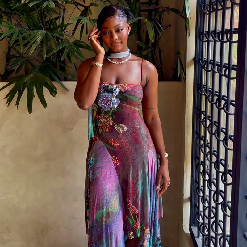 Multicolor floral maxi cami dress with fitted bodice, spaghetti straps, and layered hem