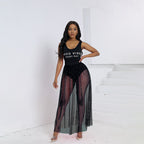 Black sleeveless summer dress with sparkly beaded bust and sheer skirt