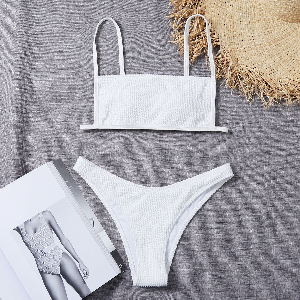 White textured bikini set: bandeau top with thin straps and low-rise matching bottoms