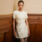 Ivory short-sleeve dress with 3D floral applique detail, straight shift silhouette