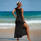 Black sleeveless knit maxi dress with chevron stripe pattern and side slit