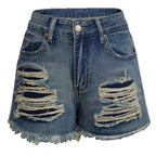 High-waist blue denim shorts with ripped front pockets and frayed raw hem