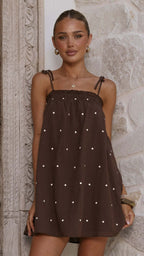 White Dots on Coffee Background