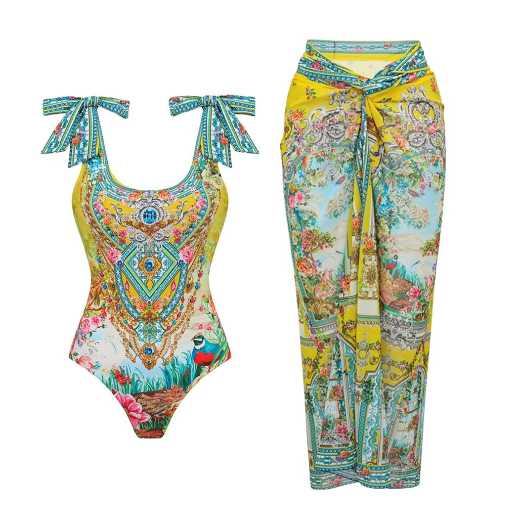 One-piece swimsuit and long swim skirt in bright yellow and teal ornate floral paisley print