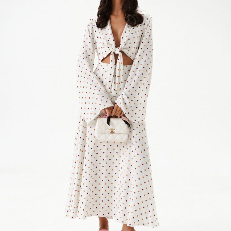 Women's polka dot long-sleeve dress with V-neck tie and midi length skirt