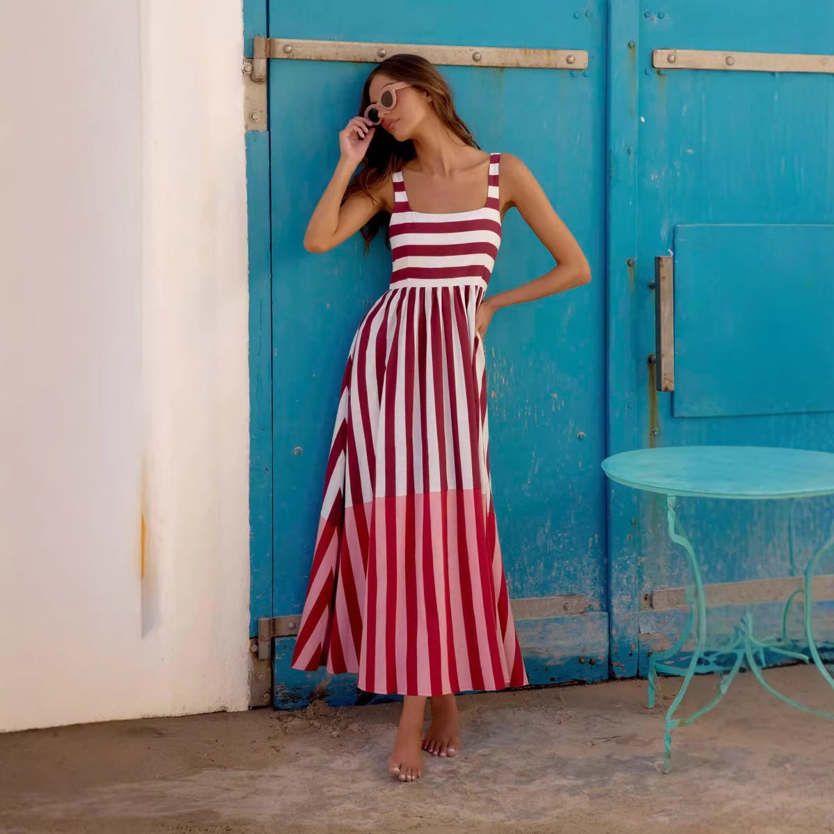 Women's maxi striped dress, red-and-white sleeveless with fitted bodice and pleated skirt