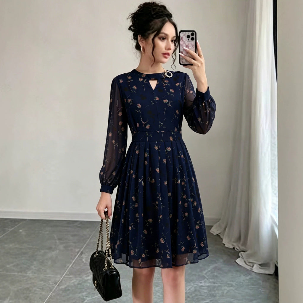 Navy chiffon long-sleeve dress with floral print, keyhole neckline, tiered skirt