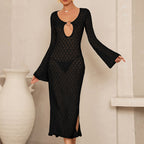 Backless women's dress in black with long sleeves and oval ring cutout